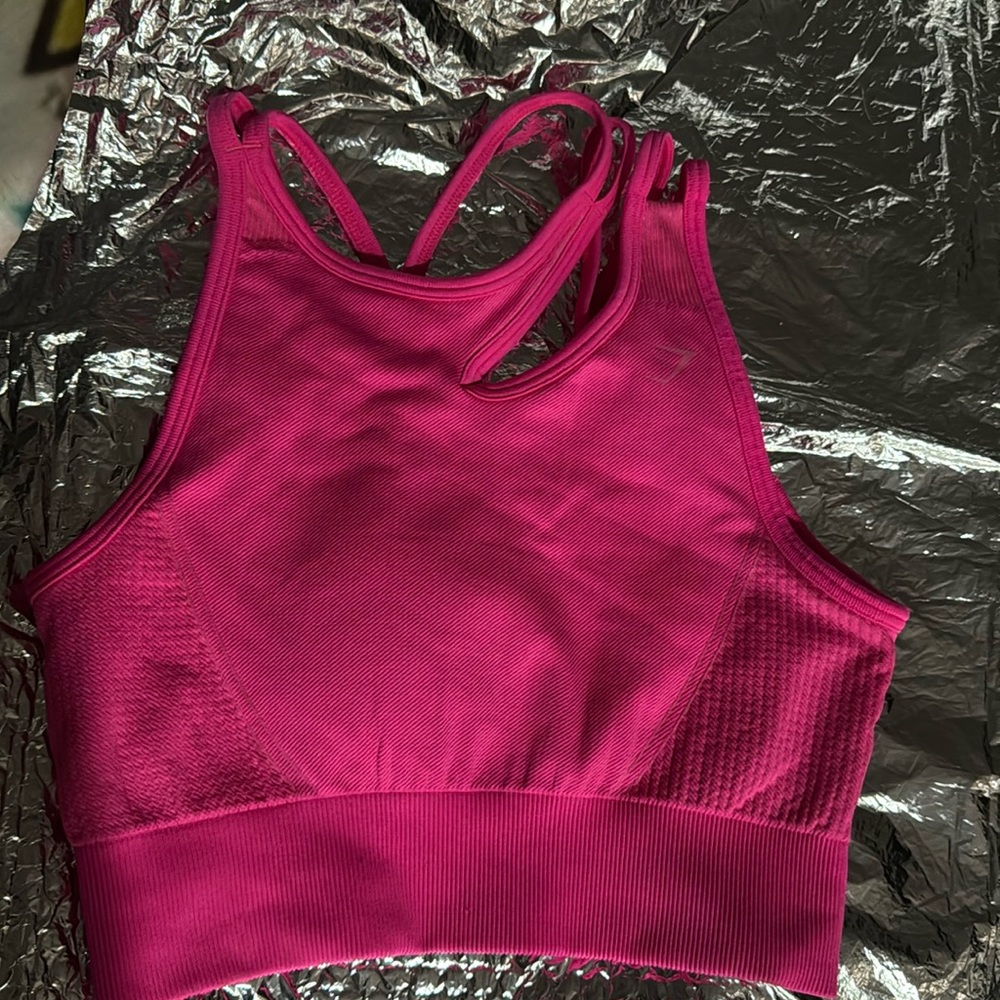Top for exercise color, pink in really good condition like new .